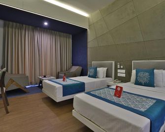 OYO 1338 호텔 하모니 - 라지코트 - 침실