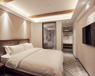 Hangzhou Yishu Shushe Hotel - Hangzhou - Habitación