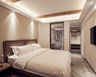 Hangzhou Yishu Shushe Hotel - Hangzhou - Bedroom