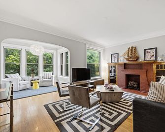 Light Filled with Tasteful Pops of Color - You Will Love This Mid-Century Modern Gem by AllSet Turnover - Chicago - Living room