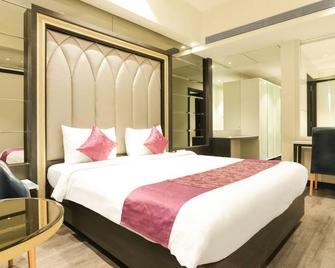 Treebo Select Gopalas Residency - Bhiwandi - Bedroom
