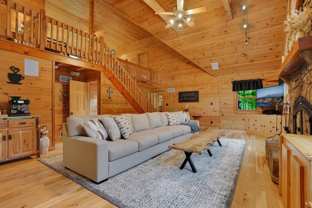 Triple Trac Lodge, upscale retreat in the countryside with 7 Bedrooms, hot tub, game room, and so much more. Plenty of fun for everyone!