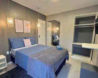 هوتل ماناوس - دوم بيدرو - ماناوس - غرفة نوم