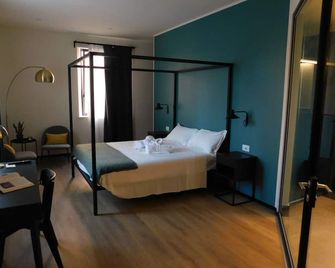 Piumaviola Beds & Apartments - Parma - Camera da letto