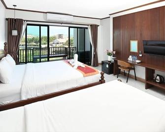Thavisouk Riverside Hotel - Vang Vieng - Phòng ngủ