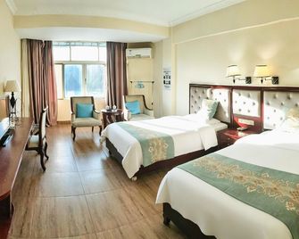 Oriental Garden Hot Spring Hotel (Xinglong Tropical Botanical Garden Branch) - Wanning - Bedroom