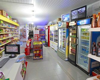 Sun City Apartments & Hotel - Side - Tienda