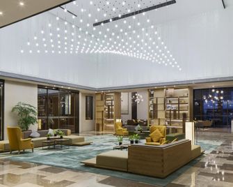 هوليداي إن هوتل آند سويتس تيانجين داون تاونا باي آيتش جي - تيانجين - ردهة