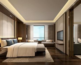 Holiday Inn Express Zhengzhou Airport By IHG - ז'נגז'ו - חדר שינה