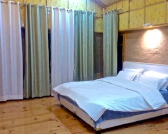 Devat Farm Cottages Tirthan Gushaini - Gushaini - Bedroom
