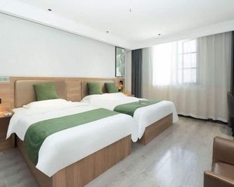 GreenTree Inn Anhui Hefei Economic Development Zone Convention and Exhibition Center Business Hotel - Hefei - Schlafzimmer