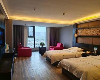Qingchun Holiday Chain Hotel - Weinan - Bedroom
