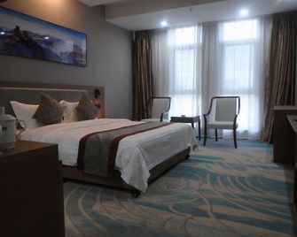 Zhangye Jiaheng International Hotel (Municipal Government & Big Buddha Temple Branch) - Zhangye - Bedroom
