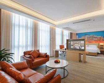Vienna International Hotel (Nanchang Initiated Outlets Shop) - Nanchang - Bedroom
