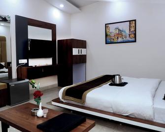 Hotel Vatika Palace - Itārsi - Habitación