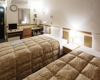 Toyoko Inn Hokkaido Asahikawa-Eki Higashi-Guchi - Asahikawa - Habitación