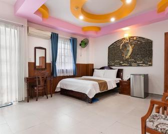 هابي هوم - هوتشي مين سيتي - غرفة نوم