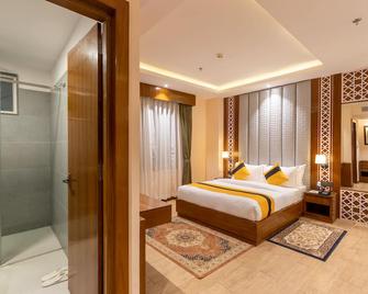 Dream International Hotel - Lumbini Sanskritik - Bedroom