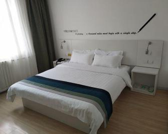 Motel 168 (Langfang high speed railway station new Chaoyang Shopping Center store) - Langfang - Slaapkamer