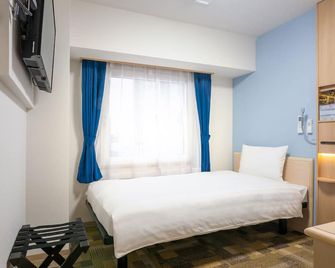 Toyoko Inn Higashi-osaka - Higashiosaka - Slaapkamer