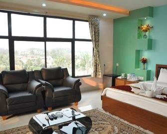 Hotel Dooars Mountain - Alīpur Duār - Sala de estar