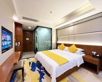 Platinum Apartment Hotel (Zhongshan Guzhen International Lighting Center) - Zhongshan - Habitación