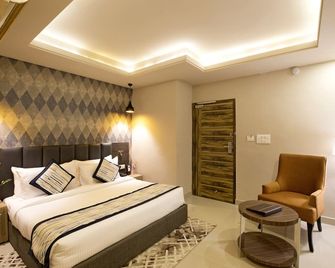 Regenta Central Noida - Нойда - Спальня