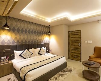 Regenta Central Noida - Noida - Schlafzimmer