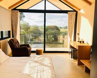 Gable Grove - Bask In Nature's Sanctuary - Anekal - Bedroom