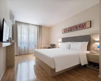 Hanting Hotel Chongqing Wushan - Enshi - Bedroom