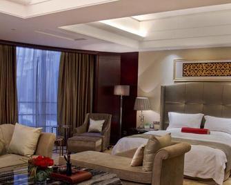 Liankang Wealth International Hotel - Mej-čou - Ložnice
