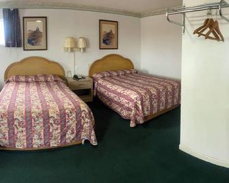 Sundown Inn - Burnet - Schlafzimmer