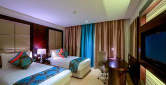 Holiday Inn Muscat Al Seeb - Masqat - Slaapkamer