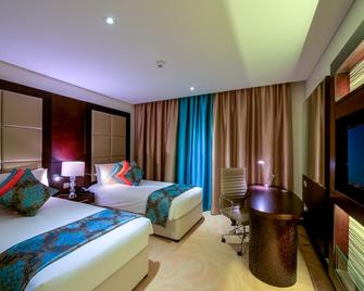 Holiday Inn Muscat Al Seeb - Mascate - Habitación