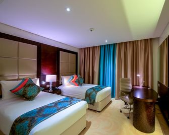 Holiday Inn Muscat Al Seeb By IHG - Muscat - Habitació