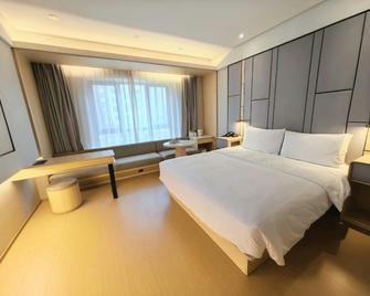 Ji Hotel Harbin Songbei Wanda Hotel - Harbin - Bedroom