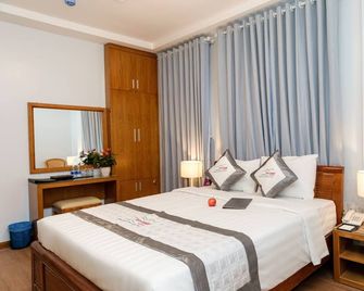 Yen Nam Hotel Hoang Van Thu - הו צ'י מין סיטי - חדר שינה