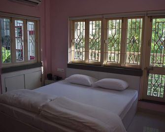 Bonussa Homestay - Kolkata - Schlafzimmer