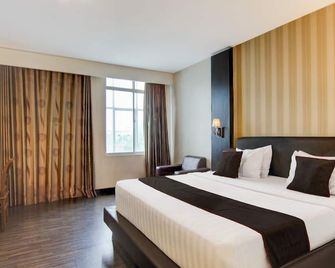 Collection O Stefani City Hotel - Pekanbaru - Habitación