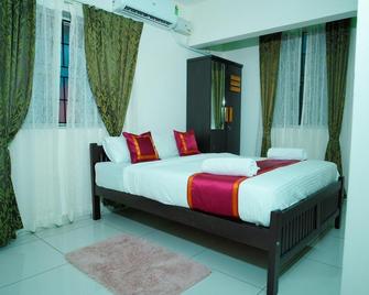 Esha Homestays - Managlore - Mangaluru - Schlafzimmer