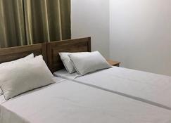 Korrine's Cottage - Beau Vallon - Habitación