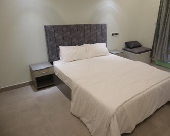 Castle Dak - Thrissur - Camera da letto