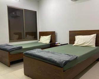 Faizi Apartments - Faisalābād - Bedroom