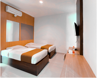 Dinasty Style Hotel - Surakarta - Slaapkamer