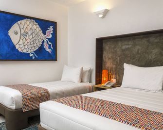 Ld Palm Beach - Playa El Agua - חדר שינה