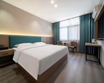Huaxinyuan Hotel - Yiyang - Chambre