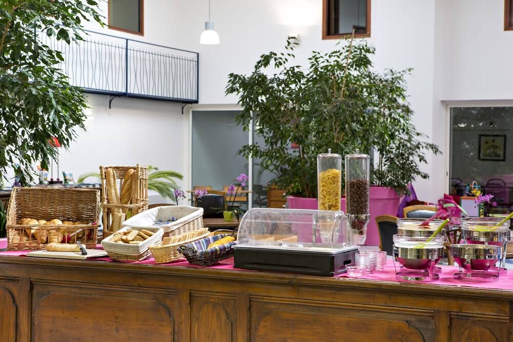 B&B HOTEL Aurillac Le Lioran - Aurillac - Bufé