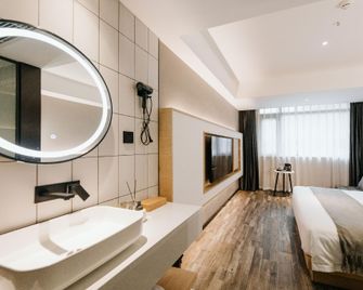 Ruijia Boutique Hotel (Yibin First People's Hospital Branch) - Їбін - Спальня