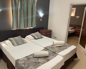 Sunstone Boutique Guest House - Saint Paul’s Bay - Спальня