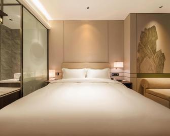 Manju Hotel Zhoushan New City Children's Park Branch - Zhoushan - Bedroom